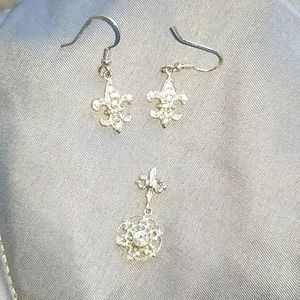 Earnings and matching necklace charm.